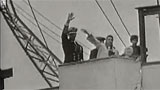 Queen waves from Royal Yacht Britannia