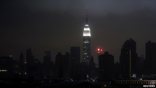 A dark Manhattan skyline